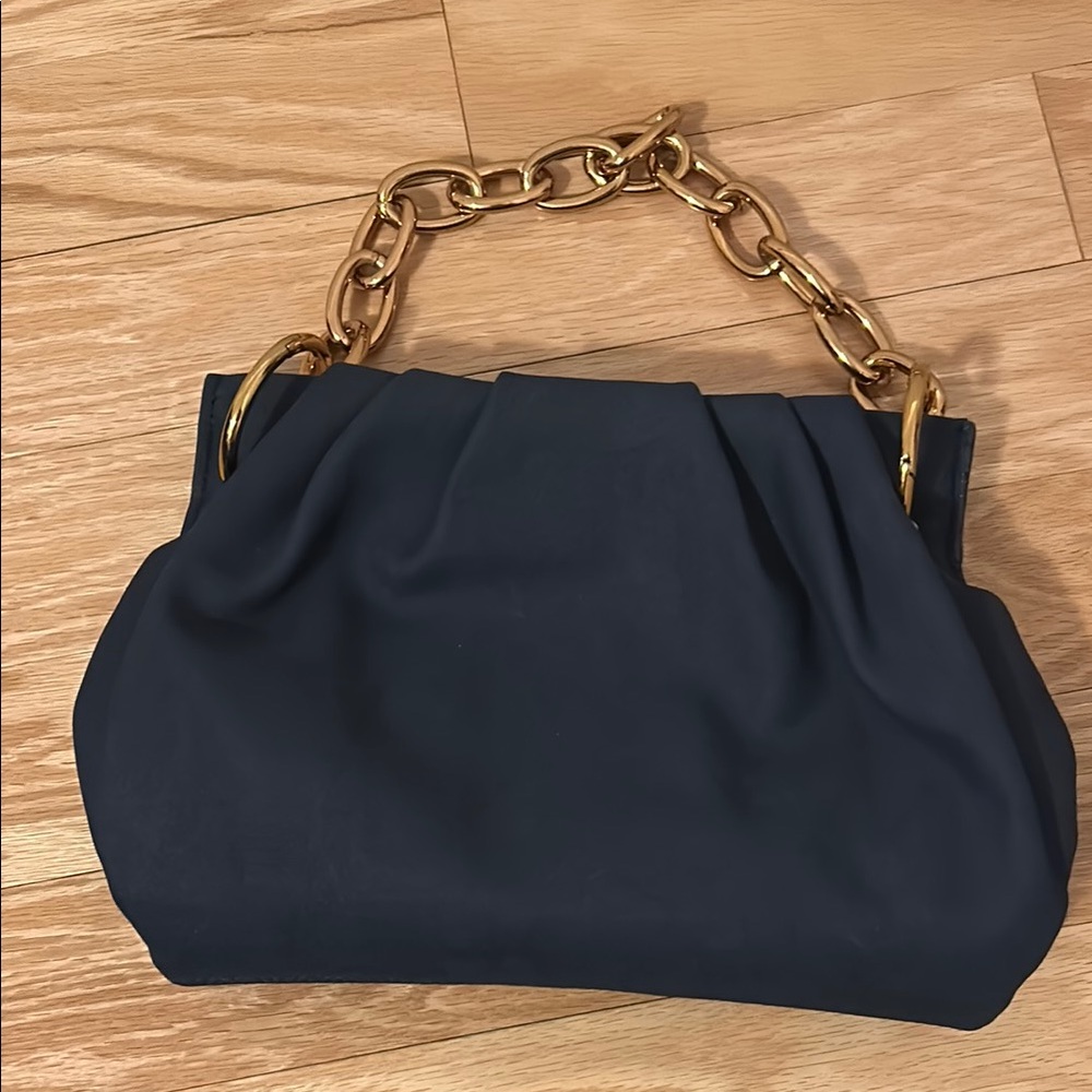 Elegant Black Handbag with Gold Chain